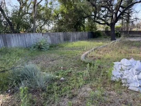 East Las Flores Drive - Lot with erosion control wattle and sandbags ready for rebuild