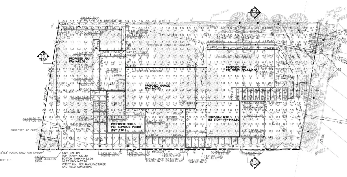 Earthwork exhibit showing 1325-gallon underground fire tank, downspouts, trench drains, and lined rain garden for Altadena residence