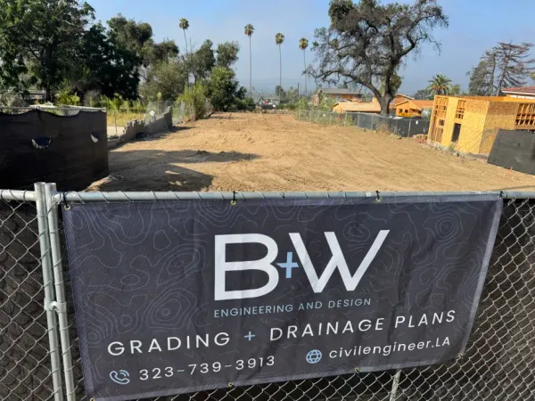 Construction site photo of the Altadena Punahou Street fire rebuild on a steep 200-foot lot