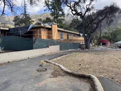 Altadena single story construction with Eaton Fire sheet flow drainage design