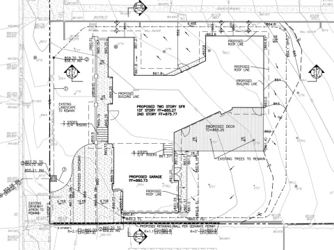 Sunset Canyon Drive - 2-story SB9 residence with 3-car garage at bottom of 34-foot slope