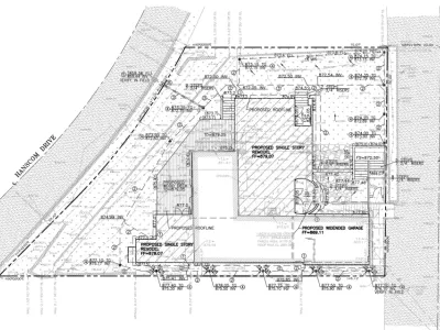 A residential grading plan for 1708 Illinois Drive in South Pasadena showing proposed contours, spot elevations, and drainage routing exiting to Hanscom Drive via rectangular steel pipe